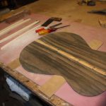 Notches are cut into the centre-seam strip for the back braces