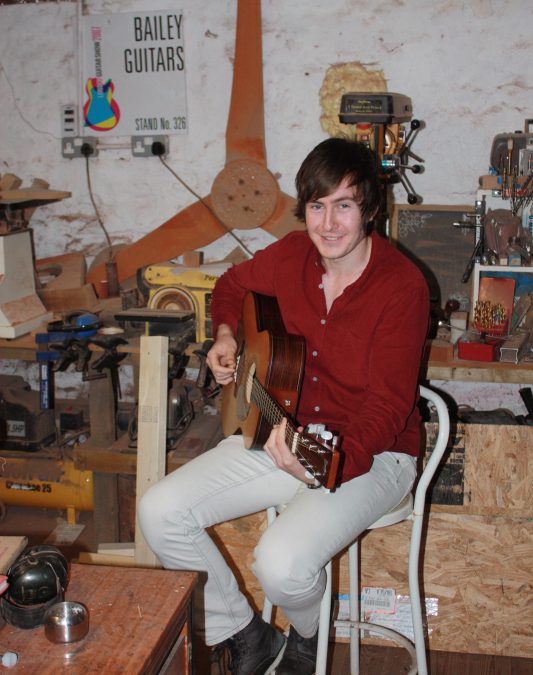 Euan Malloch plays a Bailey Guitar on The Hour Show Tonight 8pm
