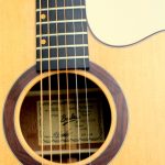 ebony fretboard with koa dot markers