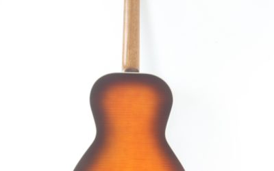 Companion acoustic guitar with open headstock