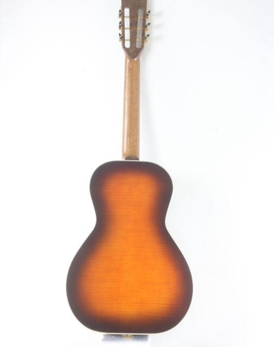 Companion acoustic guitar with open headstock