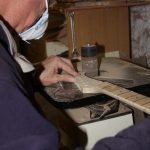Kevin starts to sand his headstock