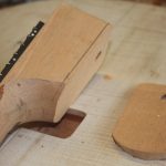 Neck angle cut into heel