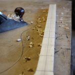 Planing a rough radius onto the fretboard