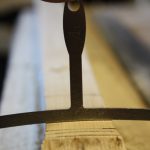 Checking the shape with a 12" radius gauge