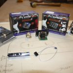 The individual string saddle with piezo pickup, acoustic preamp, and midi circuit