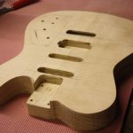 The 'trem hole' completes routing work on the front of the body