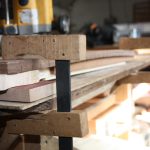 The fretboard was already radiused so I used a block under the headstock to hold it flat