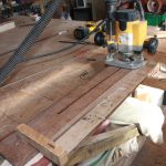 Routing in progress- an extractor takes away the dust and chips